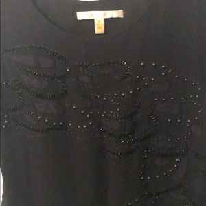 Jenny Han black tank